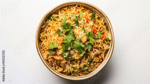 A bowl of rice with green herbs and vegetables