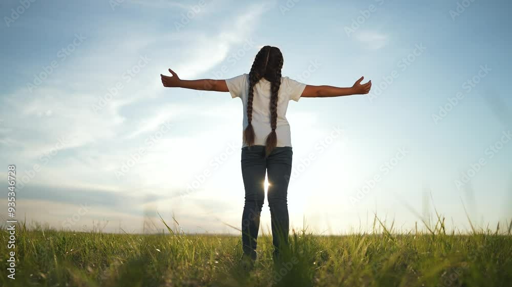 Child praying to God in nature. Peaceful child prayer outdoors. Back view child praying in field. Kid spiritual connection with God. Child embracing nature in prayer. Faithful asking God for blessings Child praying to God in nature. Peaceful child prayer outdoors. Back view child praying in field. Kid spiritual connection with God. Child embracing nature in prayer. Faithful asking God for blessings