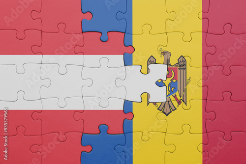 puzzle with the colourful national flag of moldova and flag of austria.