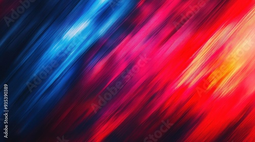 Abstract image featuring vibrant blue, red, and yellow streaks, conveying motion and energy.