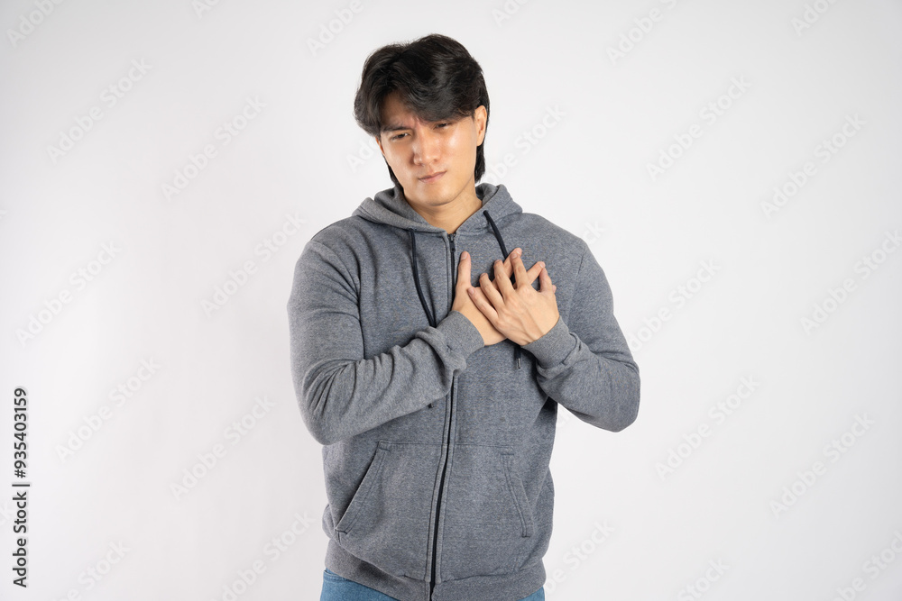 Portrait of asian man wearing hoodie posing on white background Portrait of asian man wearing hoodie posing on white background