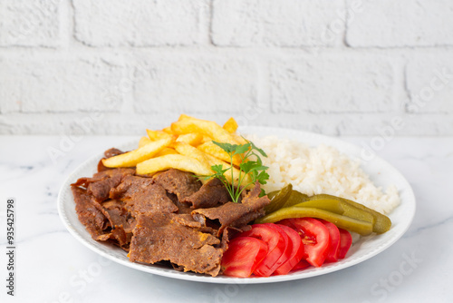 Obraz na płótnie Meat doner menu, iskender menu on plate, turkish special meat doner, food, special menu (Turkish name; pilav üstü et doner) w salonie