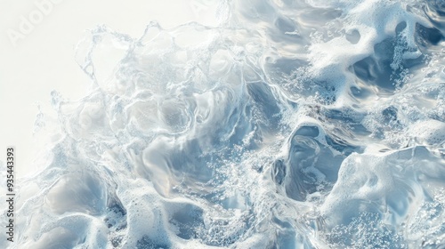Detailed top-down shot of glittering water waves on a white surface capturing the interplay of light and water with a clean, minimal backdrop.