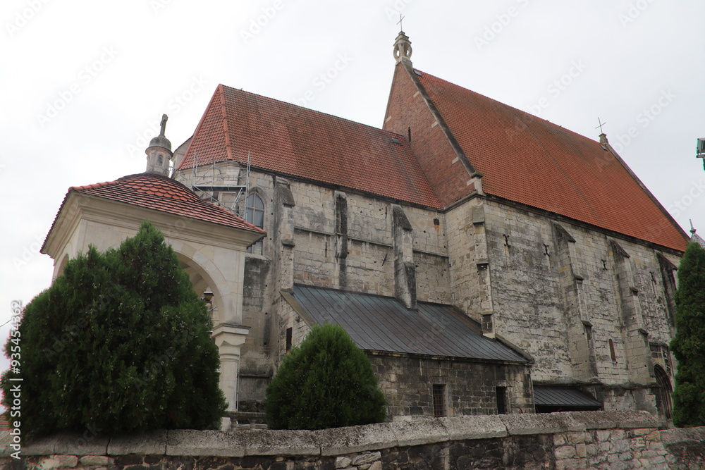 Collegiate Basilica of the Nativity of the Blessed Virgin Mary in Wiślica, Poland, a Gothic church built in the 14th century. Collegiate Basilica of the Nativity of the Blessed Virgin Mary in Wiślica, Poland, a Gothic church built in the 14th century.