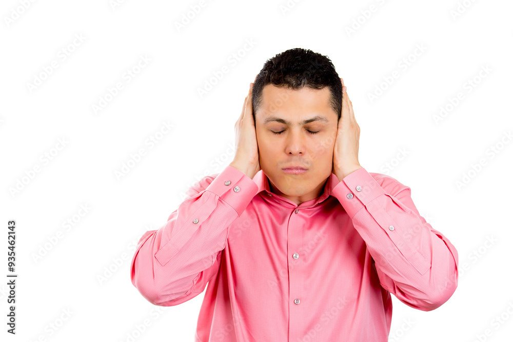 Closeup portrait of handsome young man covering his ears, closing his eyes, isolated on white background with copy space. Hear no evil concept. Closeup portrait of handsome young man covering his ears, closing his eyes, isolated on white background with copy space. Hear no evil concept.