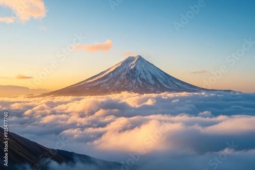 Beautiful snow capped mountain with sea of clouds during sunrise 