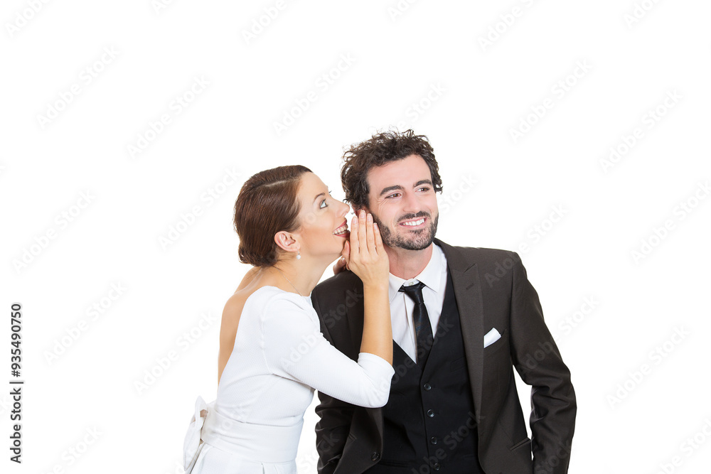 Portrait of a funny looking couple, young woman whispering a gossip to a man Portrait of a funny looking couple, young woman whispering a gossip to a man
