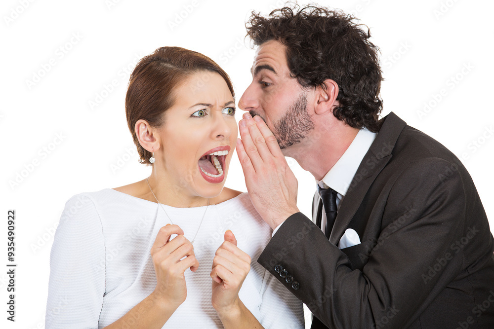 © pathdoc - Young man whispering a secret, shocking news to a stunned offended woman © pathdoc - Young man whispering a secret, shocking news to a stunned offended woman