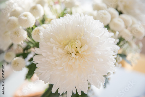 Beautiful bouquet with white lush chrysanthemums