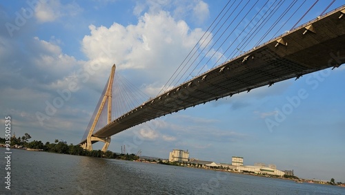 Bottom view of Can Tho cable-stayed bridge beetween Vinh Long city and Can Tho city, Mekong Delta Vietnam in sunset. 
Perspective from Hau river.