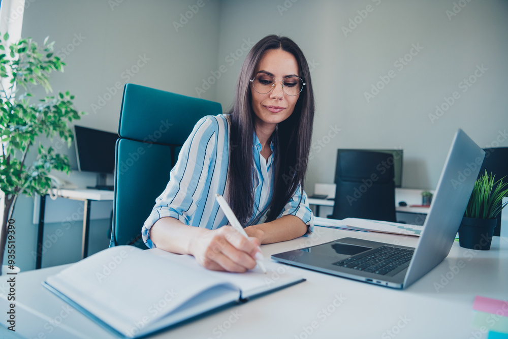 Photo of smart chief female write notebook work netbook wear striped formalwear comfortable modern office interior indoors workspace Photo of smart chief female write notebook work netbook wear striped formalwear comfortable modern office interior indoors workspace