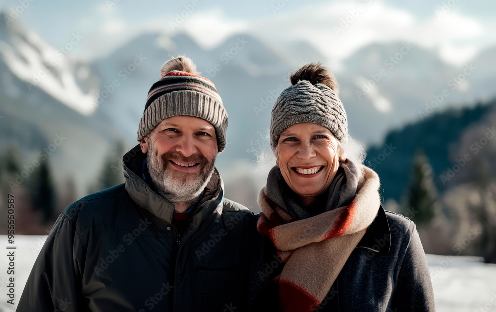 Affectionate mature couple hugging during winter holidays in the mountains. Affectionate mature couple hugging during winter holidays in the mountains.