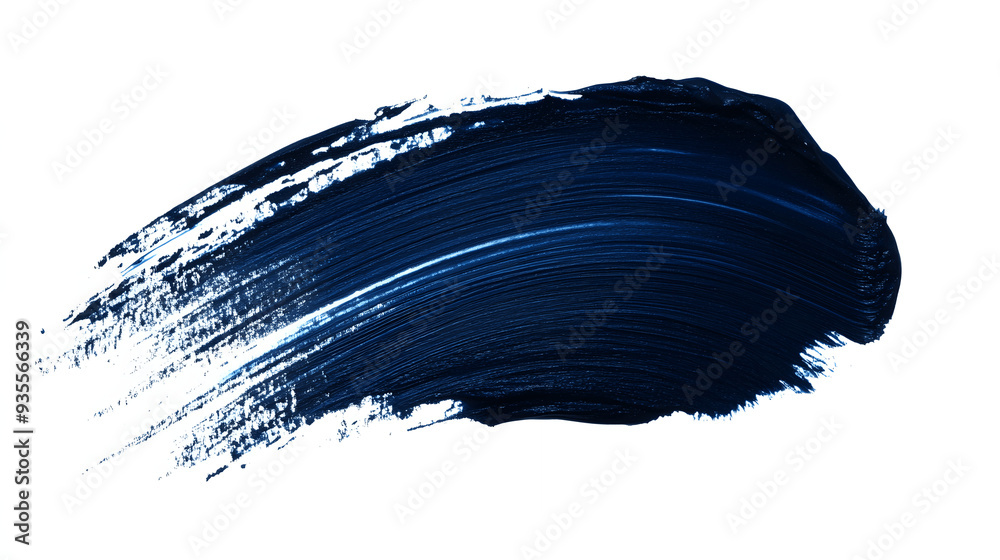 Striking brushstroke of dark blue cosmetic pigment with soft edges on white background Striking brushstroke of dark blue cosmetic pigment with soft edges on white background