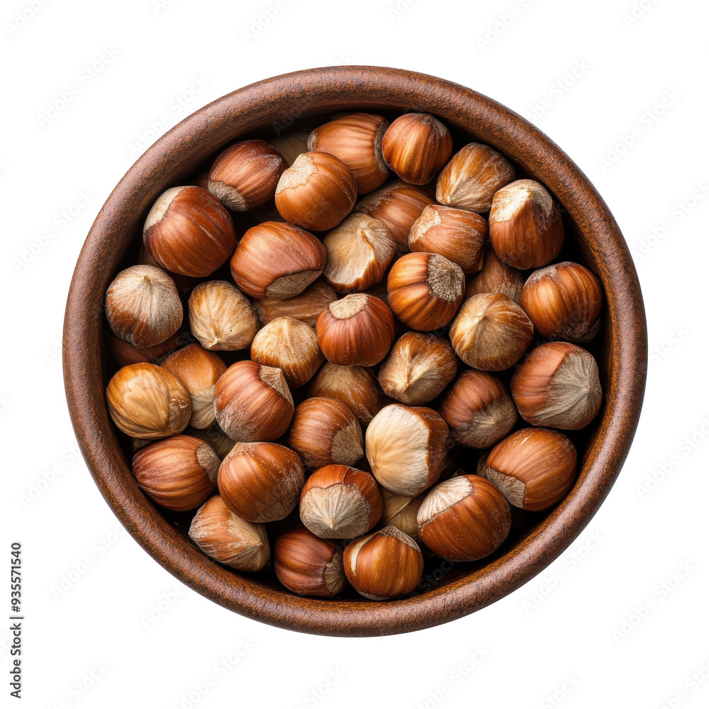 Fototapeta premium wooden bowl with whole hazelnuts isolated on white or transparent background, top view, clipping path, cut out, png