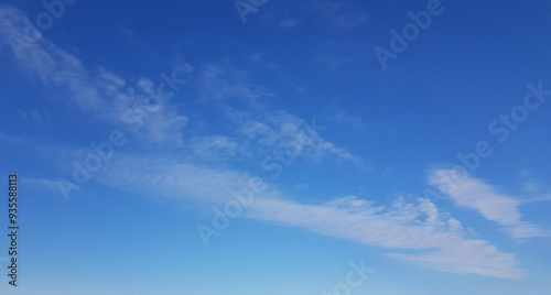 Perfect blue sunny sky background. Sky with little cloud and copy space