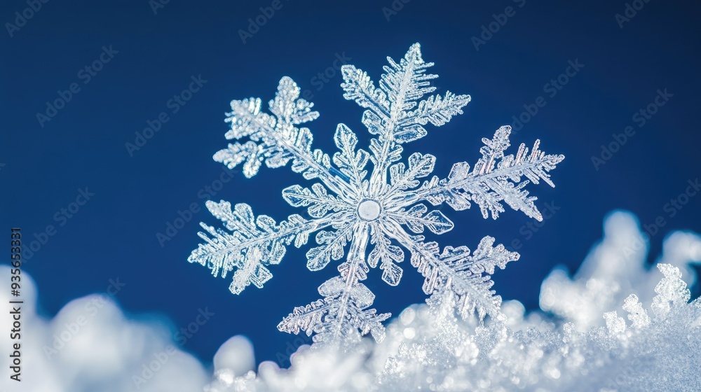 A white snowflake against a deep blue winter sky, capturing the beauty of winter A white snowflake against a deep blue winter sky, capturing the beauty of winter