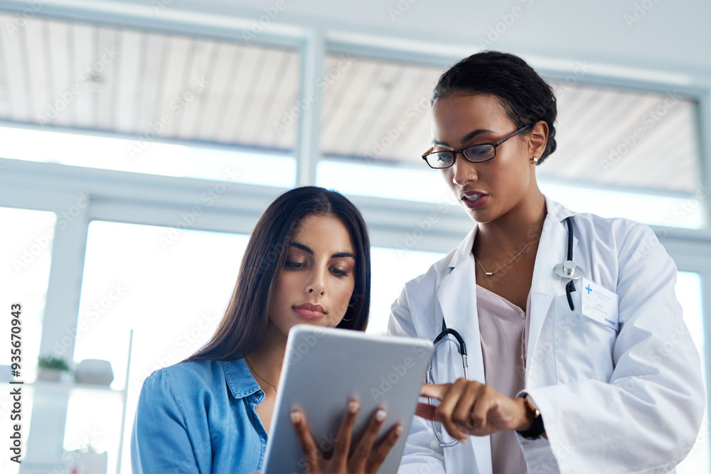 Fototapeta premium Doctor, talking and woman on tablet with patient to show healthcare update, report or info. Technology, medical professional and consultation with client for help, test results or checkup in hospital