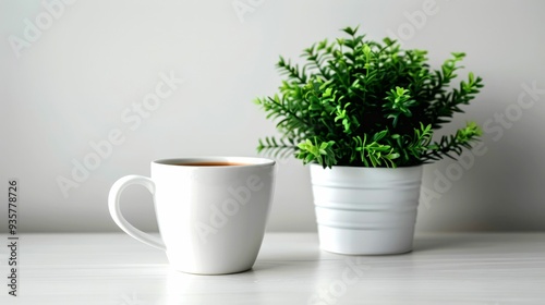 Wallpaper Mural A White Mug of Tea Beside a Potted Plant on a White Table Torontodigital.ca