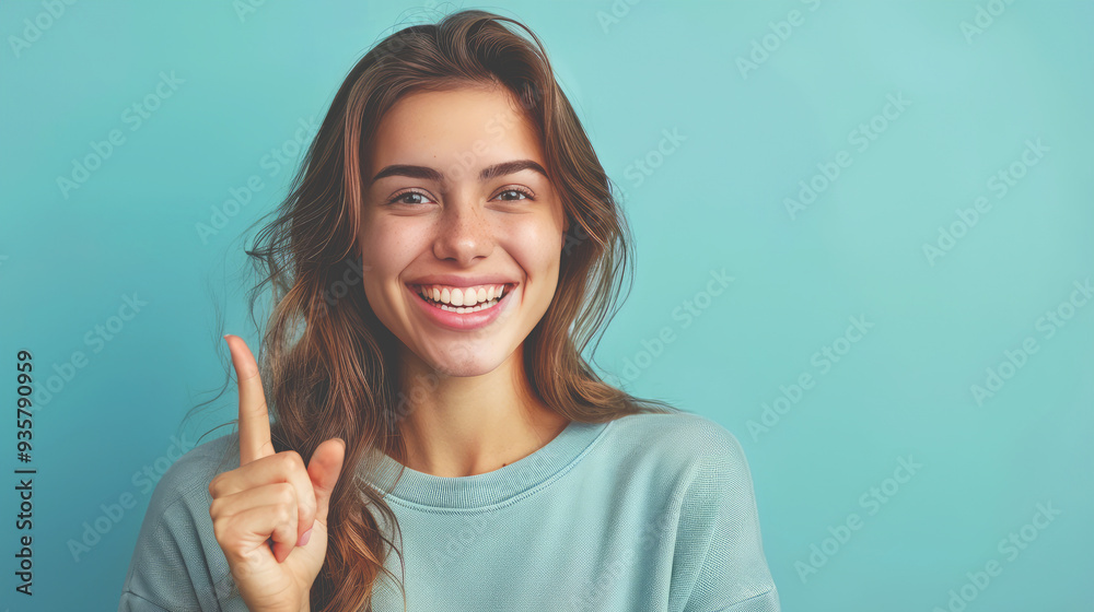 A woman makes a thumbs up gesture. A woman makes a thumbs up gesture.