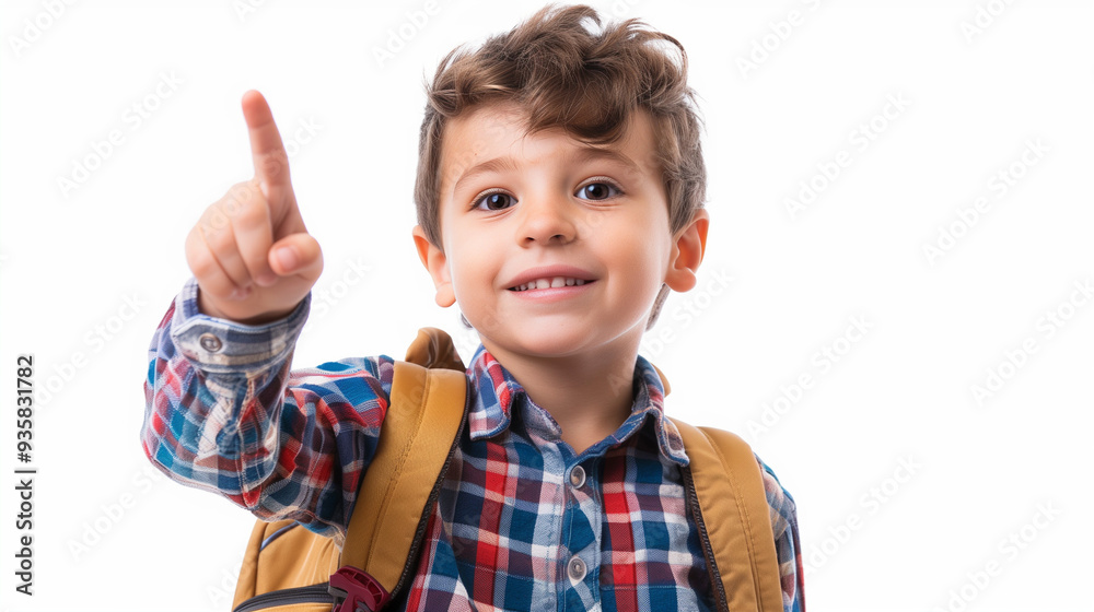 Close-Up of Little Boy with Yellow Backpack Smiling with Hand Pointing at Something on White Background Close-Up of Little Boy with Yellow Backpack Smiling with Hand Pointing at Something on White Background