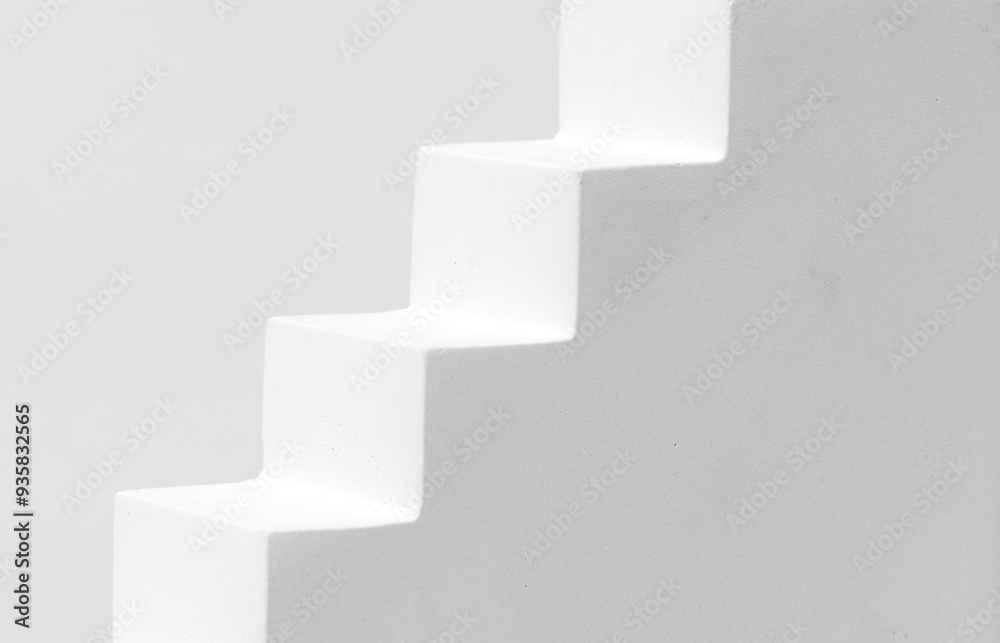 Close-up of White Staircase Prop for Product Presentation. Perfect for Showcasing Beauty Cosmetics Products. Studio photography. Close-up of White Staircase Prop for Product Presentation. Perfect for Showcasing Beauty Cosmetics Products. Studio photography.