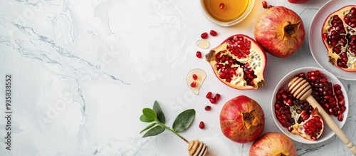 Wallpaper Mural Pomegranates apples and honey on a white background traditional foods for the Jewish New Year Rosh Hashanah Top view Copy space background Torontodigital.ca