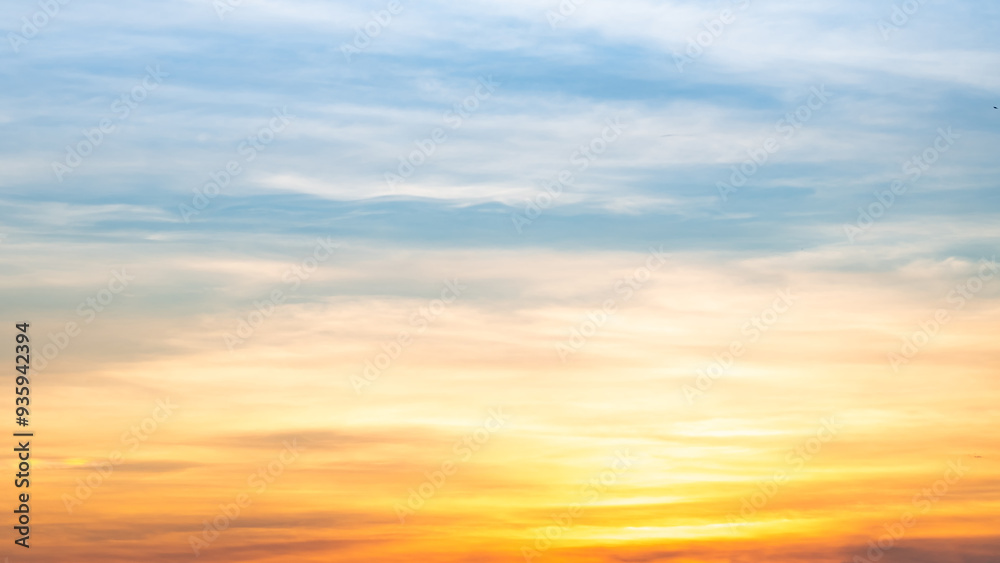 Beautiful , luxury soft gradient orange gold clouds and sunlight on the blue sky perfect for the background, take in everning,Twilight, Large size, high definition landscape photo Beautiful , luxury soft gradient orange gold clouds and sunlight on the blue sky perfect for the background, take in everning,Twilight, Large size, high definition landscape photo