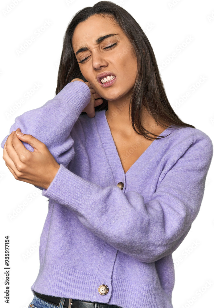 Fototapeta premium Hispanic young woman massaging elbow, suffering after a bad movement.