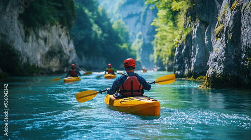 Wallpaper Mural Kayakers navigating through rapids in a remote river canyon, representing the thrill of adventure Torontodigital.ca