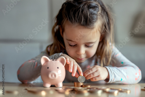 Kid Collects Coins for Savings photo