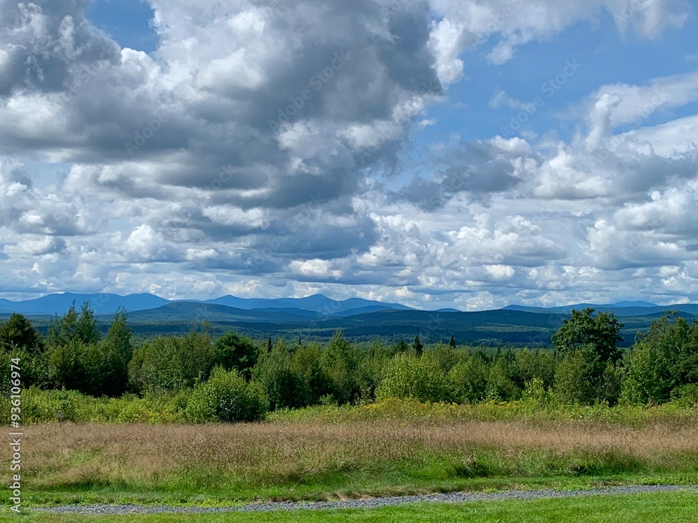 Sweeping view of Maine mountains and green fields in late summer. Sweeping view of Maine mountains and green fields in late summer.