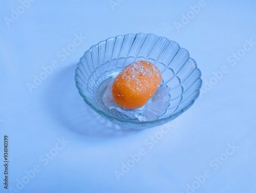 Gulab jamun, in a bowl gulabjamun, gulaabjamun, rose water berry sweet solitary sweetness, confectionary or dessert, Indian south asian subcontinent, mithai popular sweet of India, Pakistan, Bangla photo