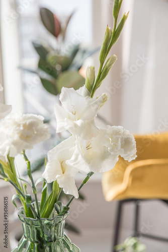 Beautiful bouquet of white carnations and gladiol photo