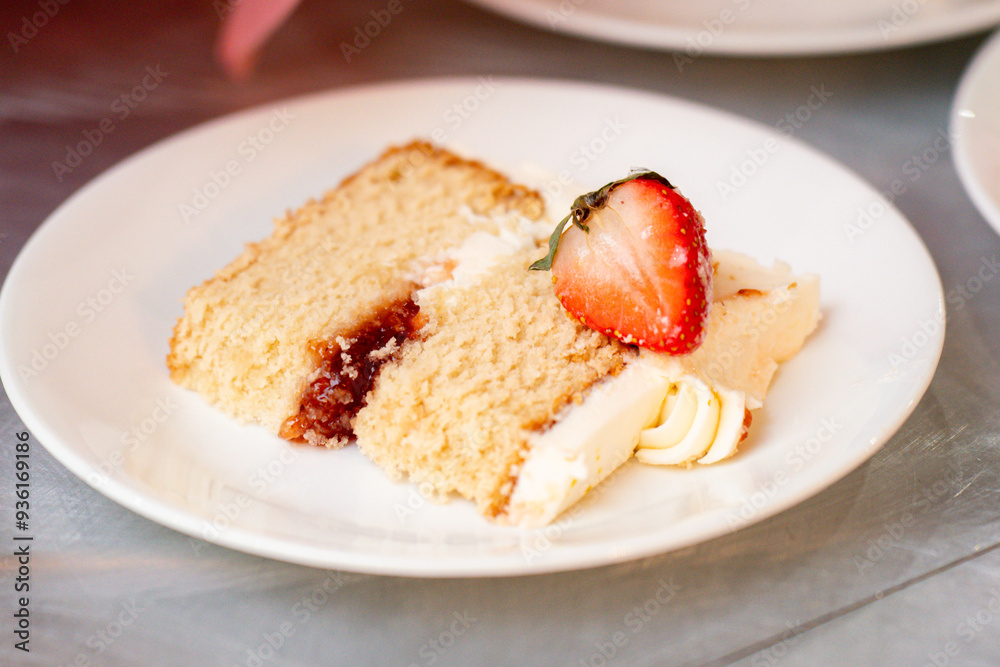 close up of a slice of Strawberry shortcake on A plate close up of a slice of Strawberry shortcake on A plate
