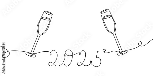 Celebration of the New Year with champagne glasses and the year 2025 written in script