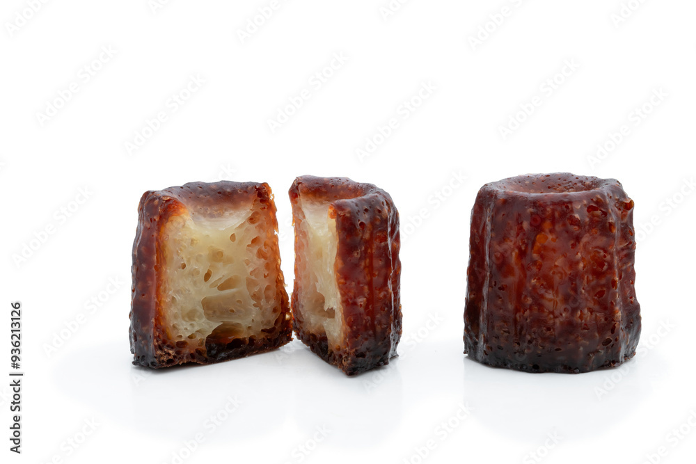 Canelé cookies isolated in white background