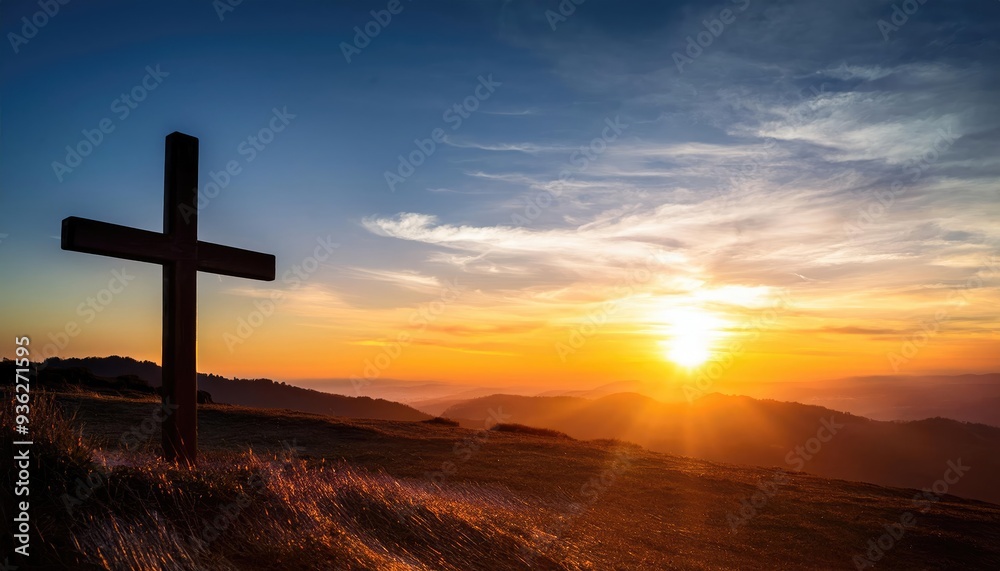 A serene sunset casts a warm glow over a cross on a hill, symbolizing peace and reflection in nature's beauty. A serene sunset casts a warm glow over a cross on a hill, symbolizing peace and reflection in nature's beauty.