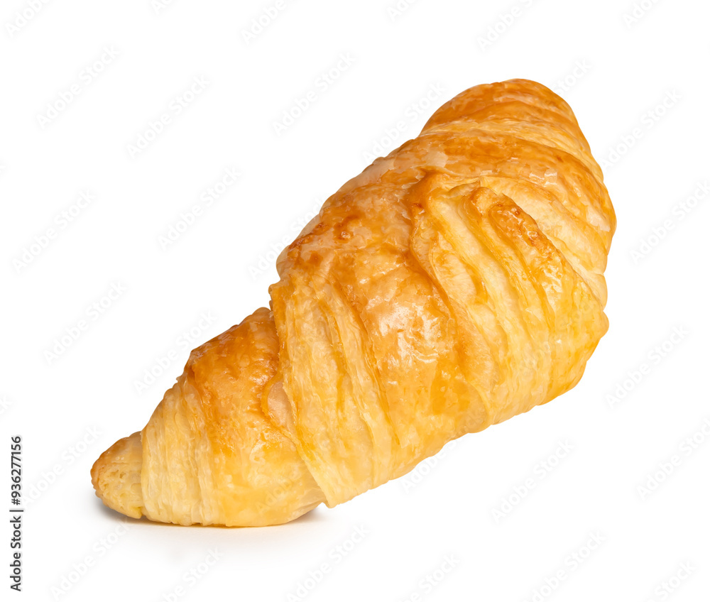 Side view of golden croissant isolated on white background with clipping path