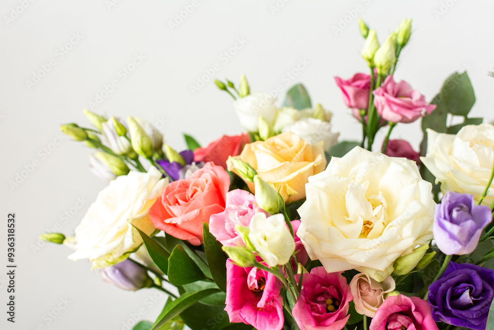Celebrate special occasions with a colorful summer bouquet featuring fresh roses, eucalyptus, and eustoma blooms, creating an elegant and fragrant floral arrangement Celebrate special occasions with a colorful summer bouquet featuring fresh roses, eucalyptus, and eustoma blooms, creating an elegant and fragrant floral arrangement