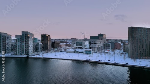 Winter aerial cityscape of Aalborg, North Jutland Region (Nordjylland), Denmark. Famous landmark - House of Music (Musikkens Hus) is in the center photo