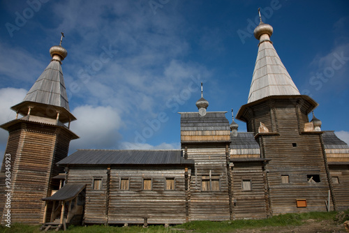 Russia Arkhangelsk region, Kargopolye, Kiprovo, wooden church on a cloudy summer day photo