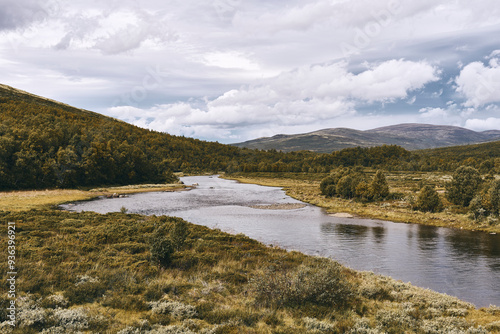 View of Einunna River from Einunndalen Valley, Norway's longest summer farm valley or "seterdal", a day in late summer of 2024.