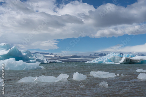 The view of Jökulsárlón Glasier Lagoon in Vatnajökull National Park in Iceland. In summer under blue sky.	 photo