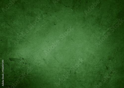 Green textured concrete wall background. Dark edges