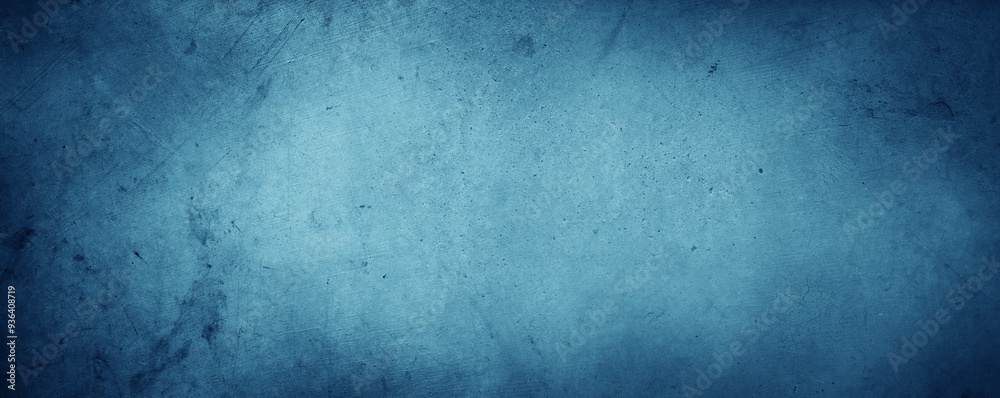 Blue textured concrete wall background. Dark edges Blue textured concrete wall background. Dark edges