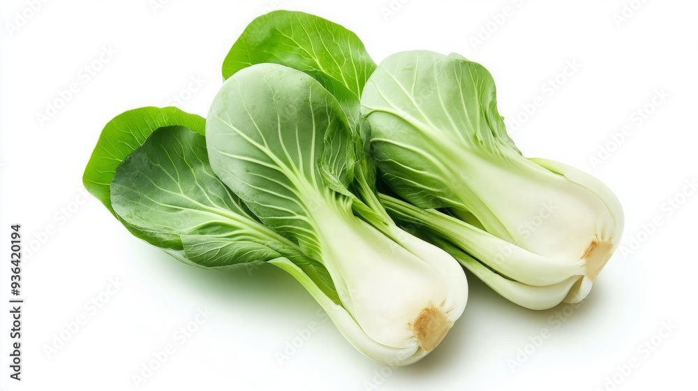 Freshly Chopped Bok Choy Isolated on a White Background, Highlighting the Vibrant Green of Chinese Cabbage in a Healthy and Appetizing Presentation. Freshly Chopped Bok Choy Isolated on a White Background, Highlighting the Vibrant Green of Chinese Cabbage in a Healthy and Appetizing Presentation.