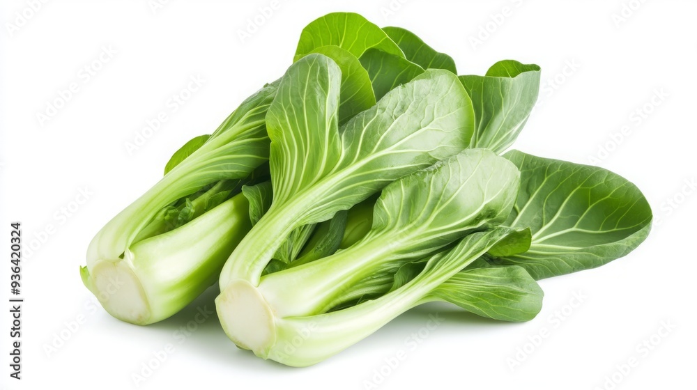 Freshly Chopped Bok Choy Isolated on a White Background, Highlighting the Vibrant Green of Chinese Cabbage in a Healthy and Appetizing Presentation. Freshly Chopped Bok Choy Isolated on a White Background, Highlighting the Vibrant Green of Chinese Cabbage in a Healthy and Appetizing Presentation.