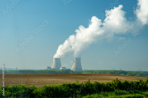 View on cooling towers of nuclear power plant thermal power station in which heat source is nuclear reactor, France, Europe