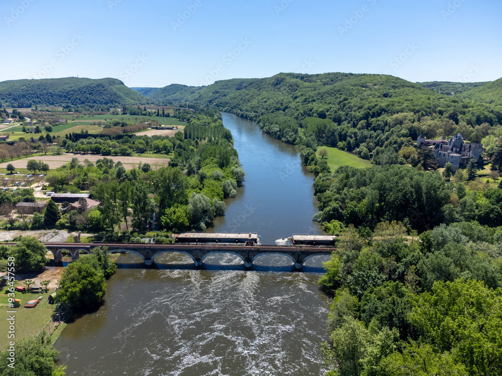 Aerial view on Dordogne river near Beynac-et-Cazenac village located in Dordogne department in southwestern France Aerial view on Dordogne river near Beynac-et-Cazenac village located in Dordogne department in southwestern France