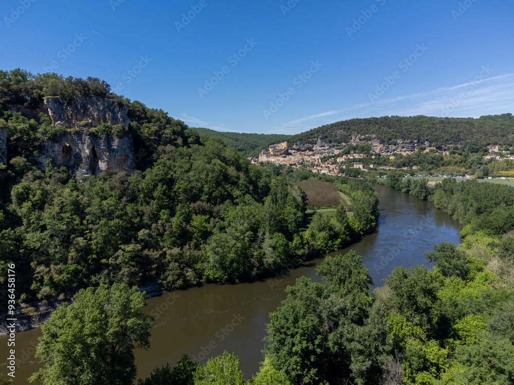 Aerial view on Dordogne river near .La Roque-Gageac village located in Dordogne department in southwestern France Aerial view on Dordogne river near .La Roque-Gageac village located in Dordogne department in southwestern France